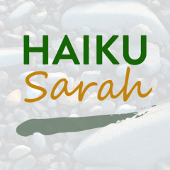 Centered text, with "Haiku" in green, all caps, sans-serif font. Below is "Sarah", brownish orange, in a cursive-esq font. Below that a gray-ish green ink brush stroke. Faded background of river rocks.
